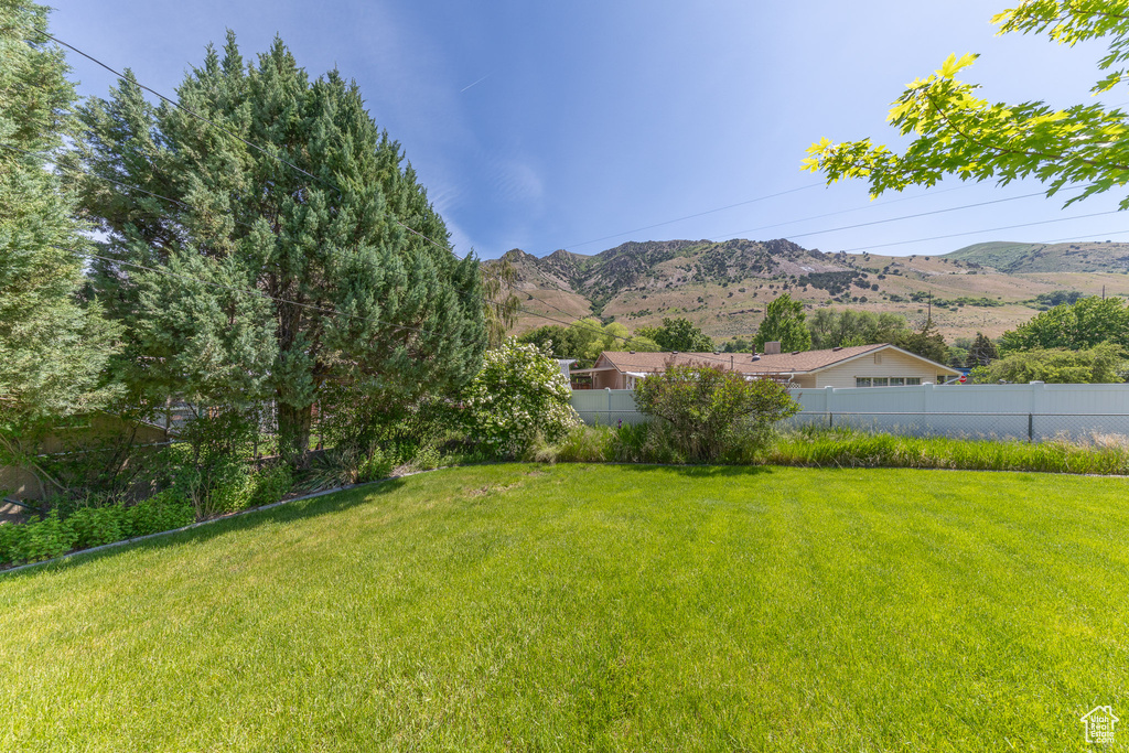 View of yard with a mountain view