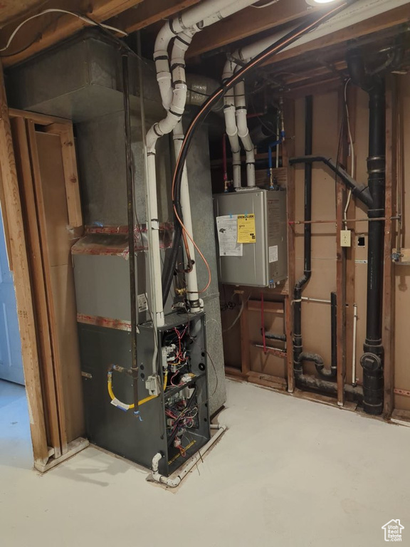 Utilities featuring water heater and heating unit