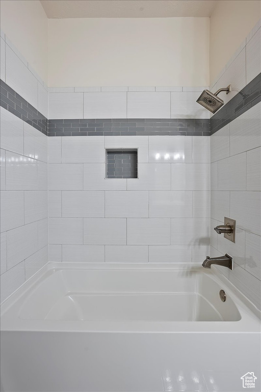 Full bath featuring shower / tub combination