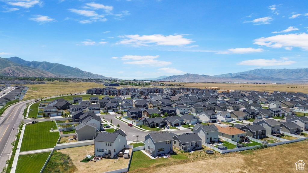 Aerial view of residential area with a mountain backdrop