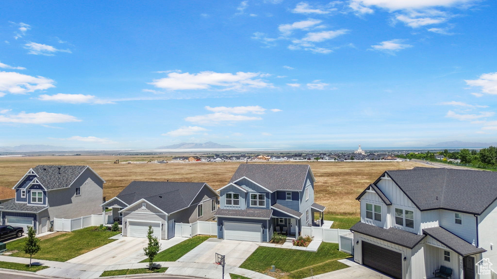 Aerial perspective of suburban area featuring mountains
