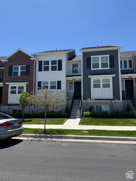 Townhome / multi-family property with board and batten siding