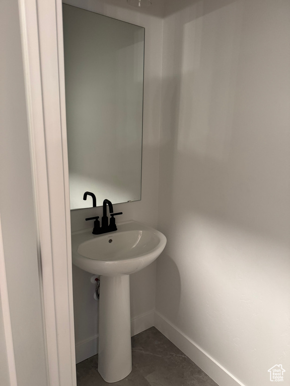 Bathroom featuring baseboards