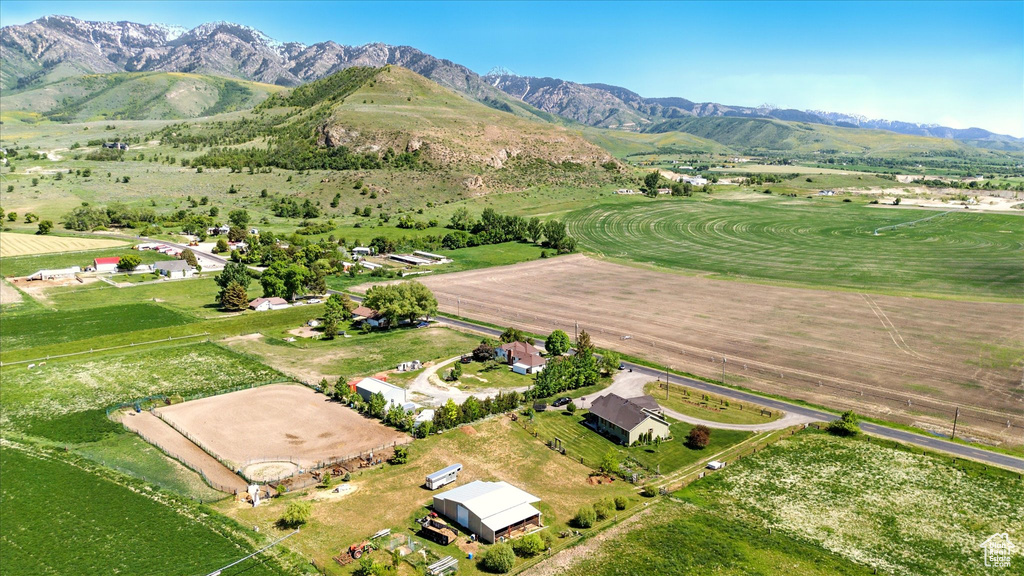 Aerial overview of property\\\'s location featuring rural landscape and a mountain backdrop