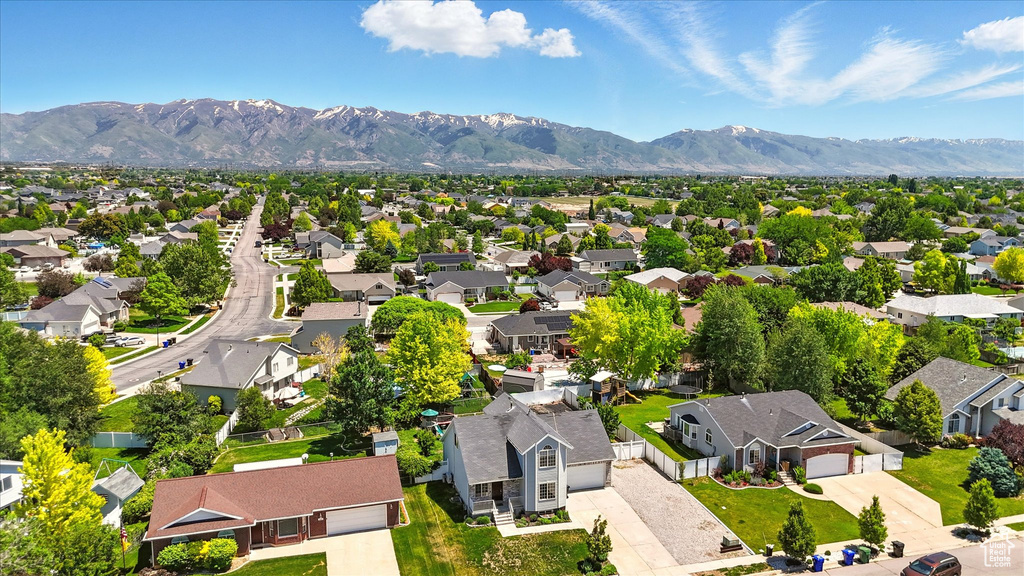 Aerial view of residential area with mountains
