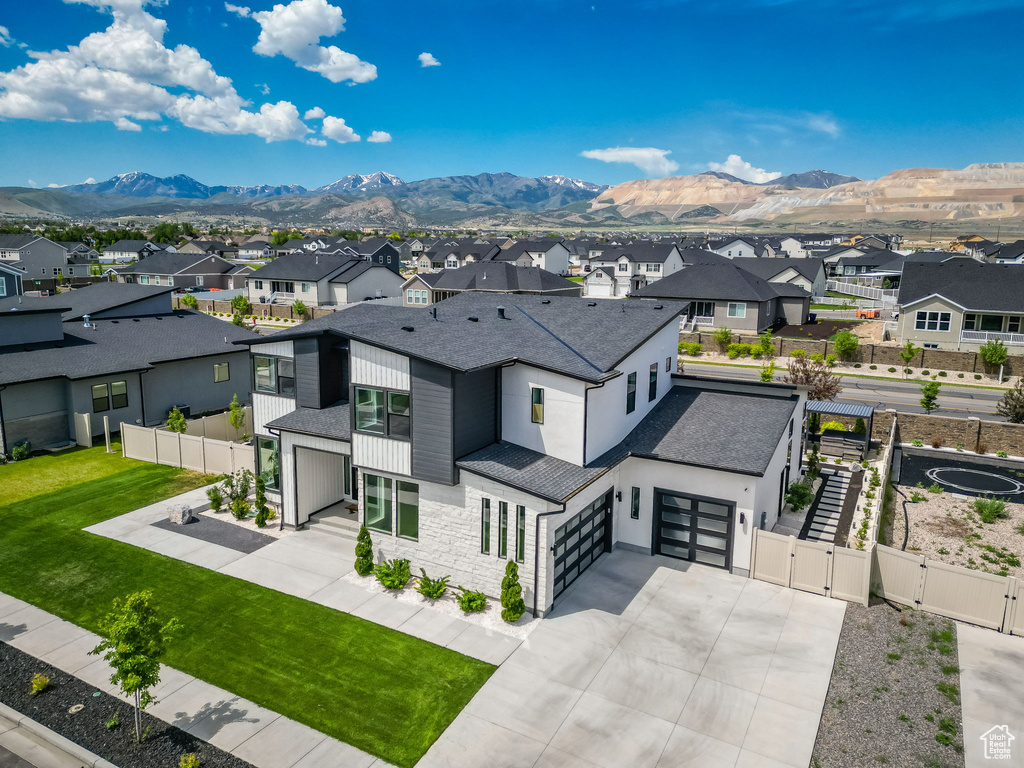 Aerial view of residential area with mountains