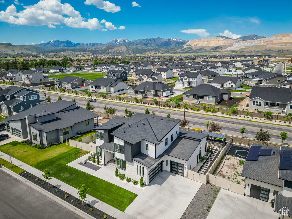 Aerial perspective of suburban area with mountains