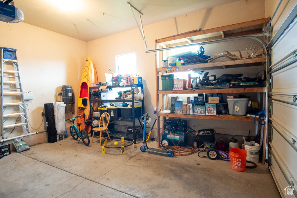 Garage featuring a garage door opener