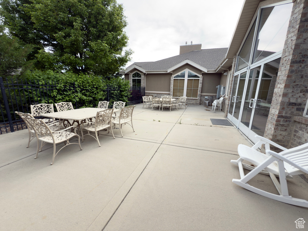 View of patio featuring outdoor dining area