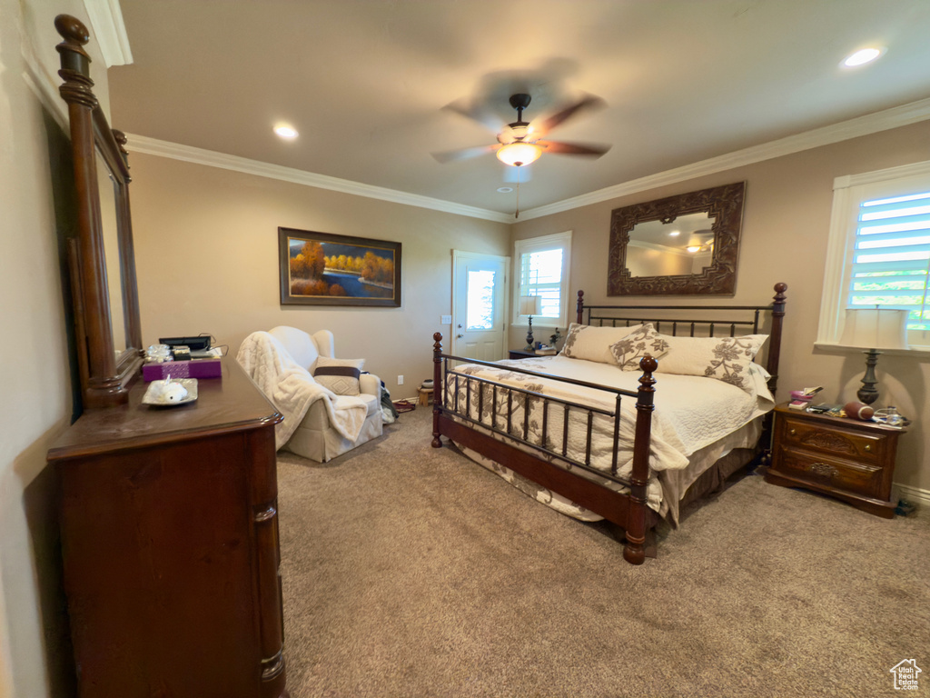 Carpeted bedroom with baseboards, ornamental molding, ceiling fan, and recessed lighting