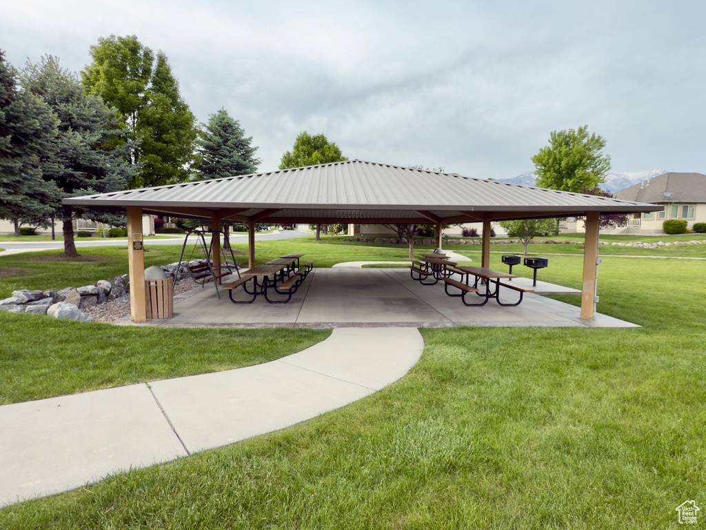 View of home\\\\\\\'s community featuring a gazebo and a yard