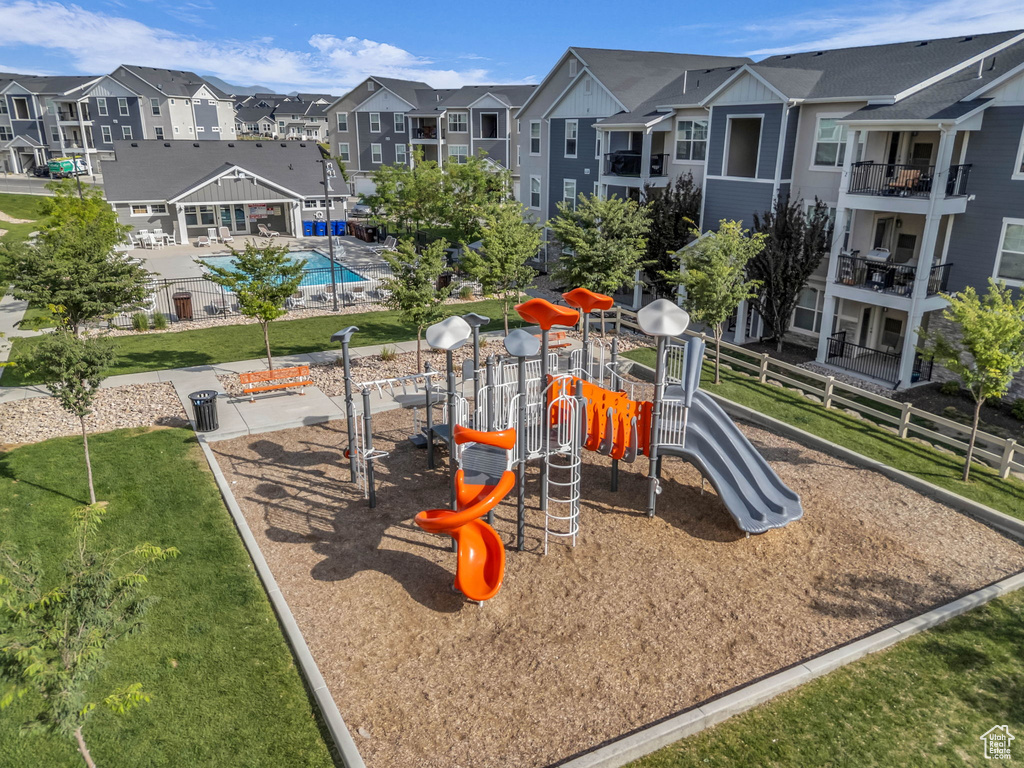 Community jungle gym featuring a residential view