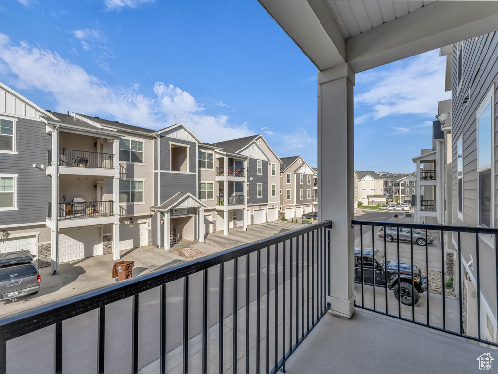 Balcony featuring a residential view