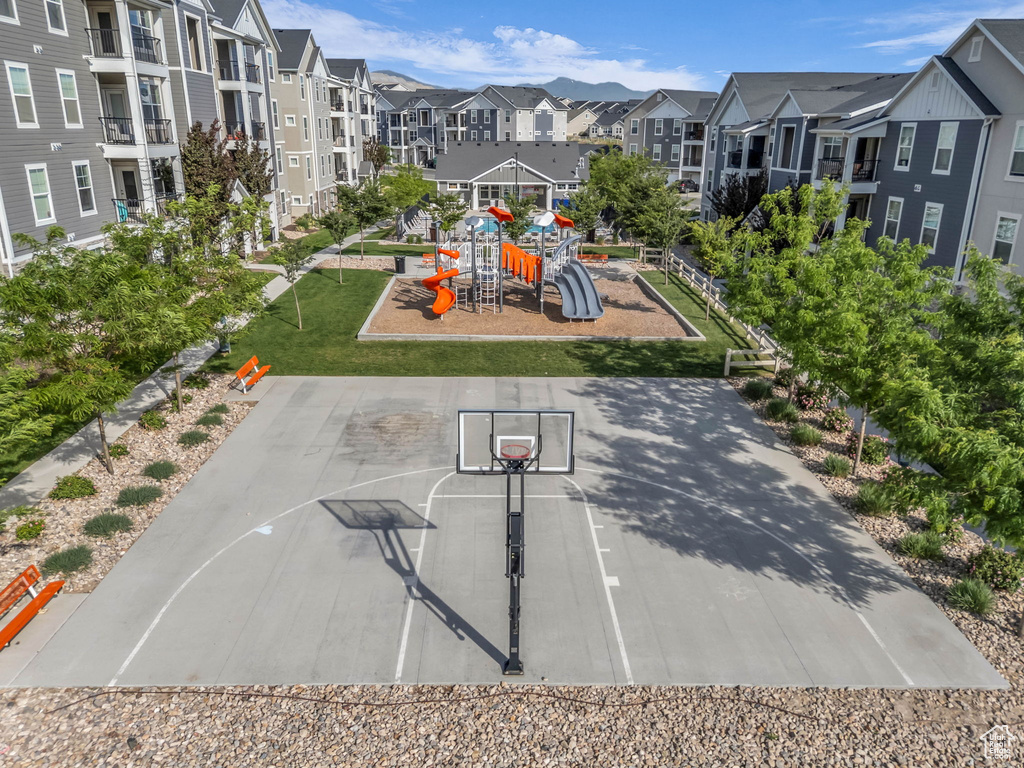 Surrounding community with a residential view and community basketball court