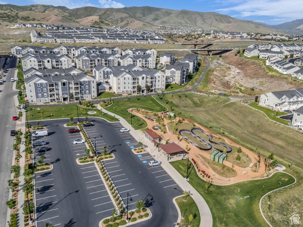 Aerial view of property's location with a mountainous background