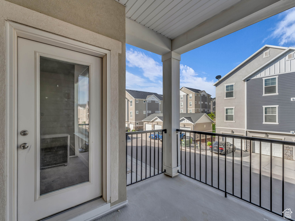 Balcony featuring a residential view