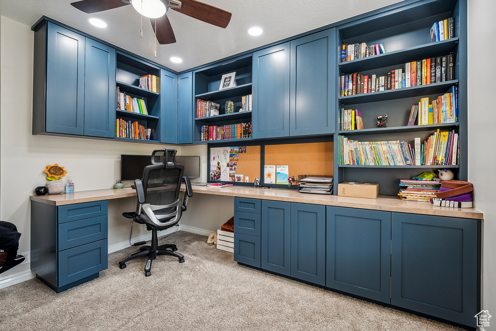 Office space with built in study area, light carpet, ceiling fan, baseboards, and recessed lighting