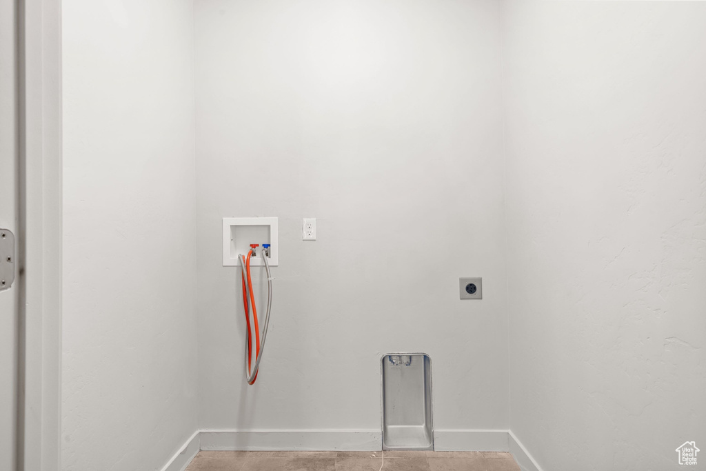 Laundry area featuring washer hookup, baseboards, and hookup for an electric dryer