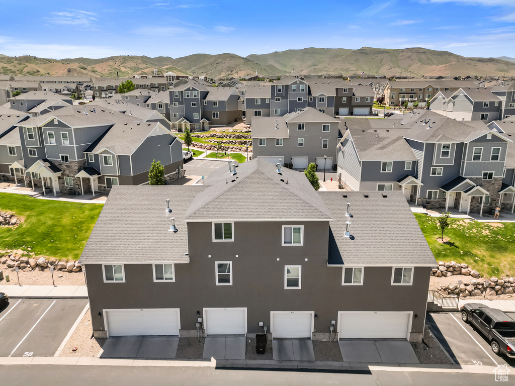 Aerial perspective of suburban area featuring mountains