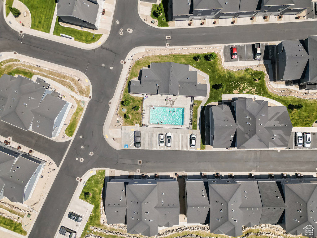 Aerial view of property's location with nearby suburban area