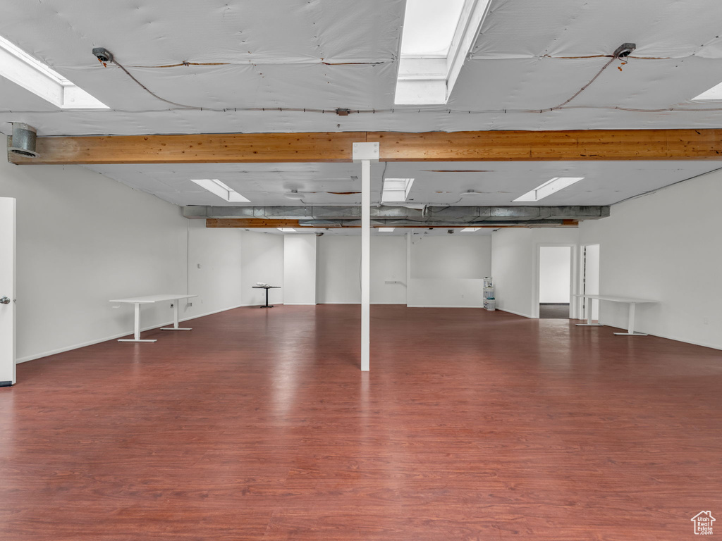 Finished below grade area featuring wood finished floors