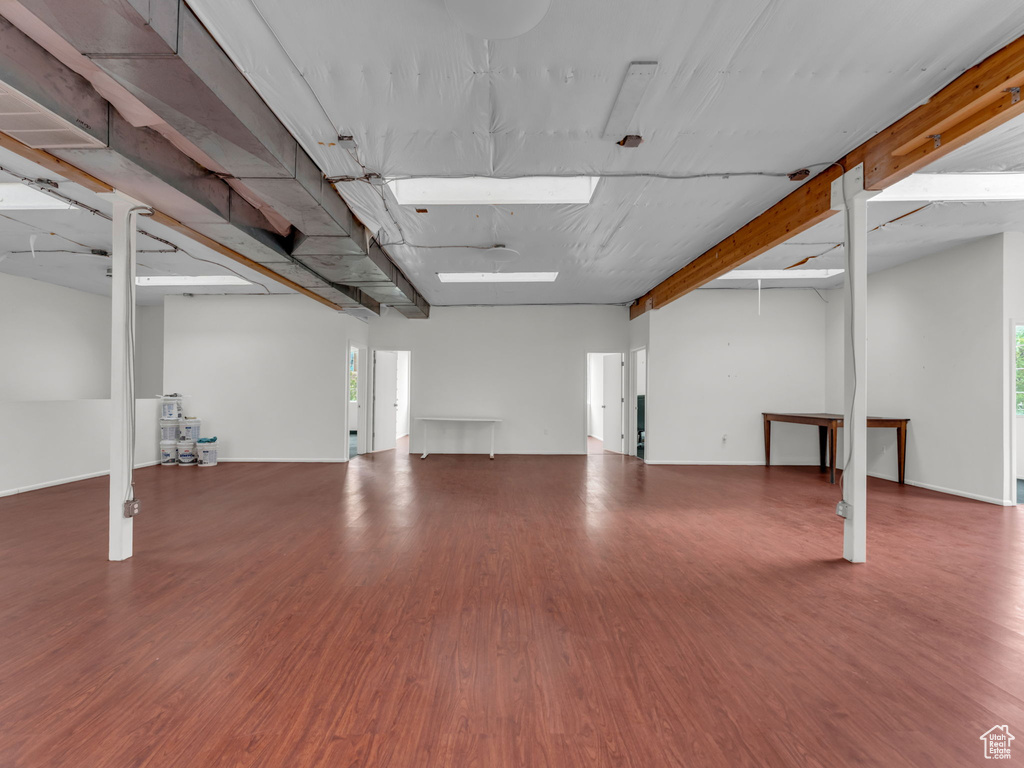 Below grade area featuring wood finished floors