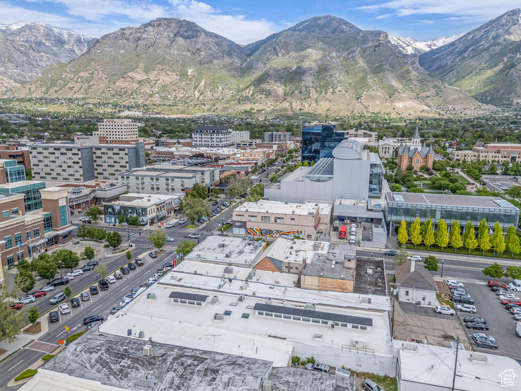 View of mountain background featuring nearby urban area