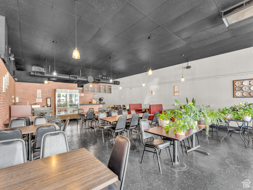 Dining area with brick wall