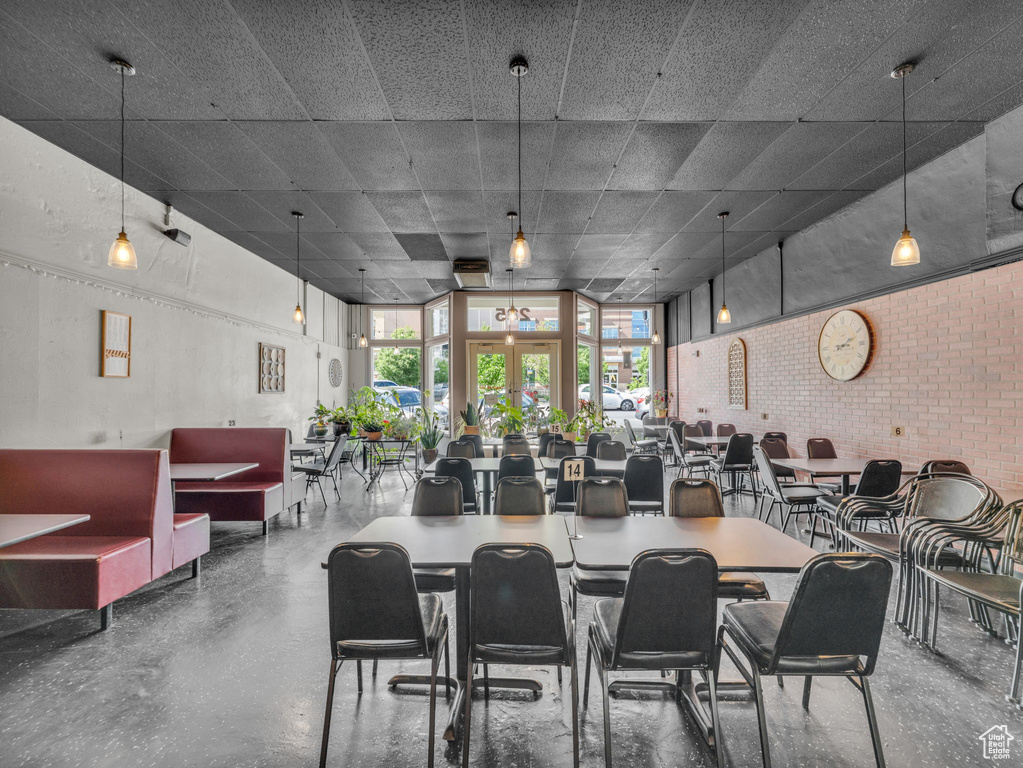 Dining room with brick wall
