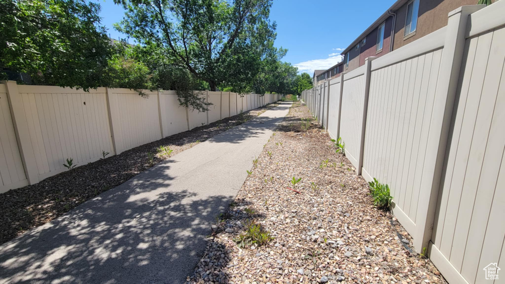 View of asphalt alley