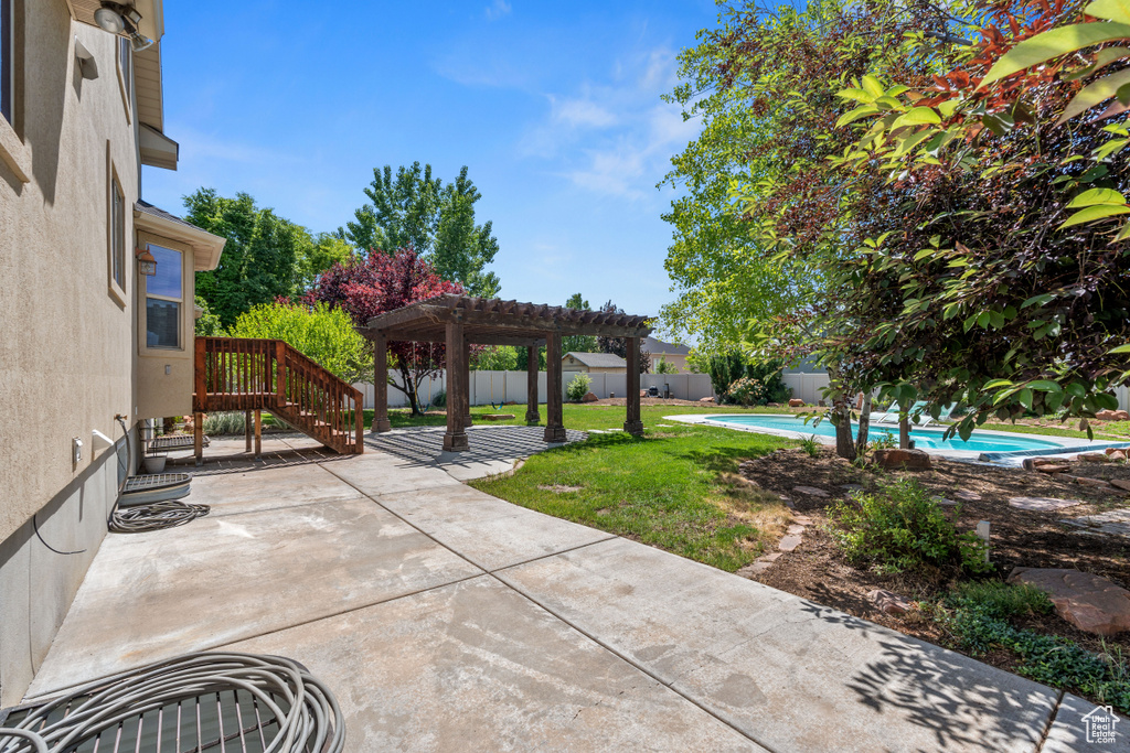 View of patio with a pergola