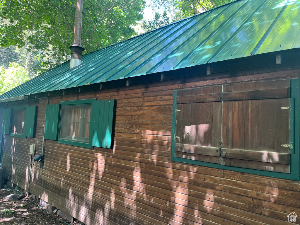 View of home's exterior featuring metal roof
