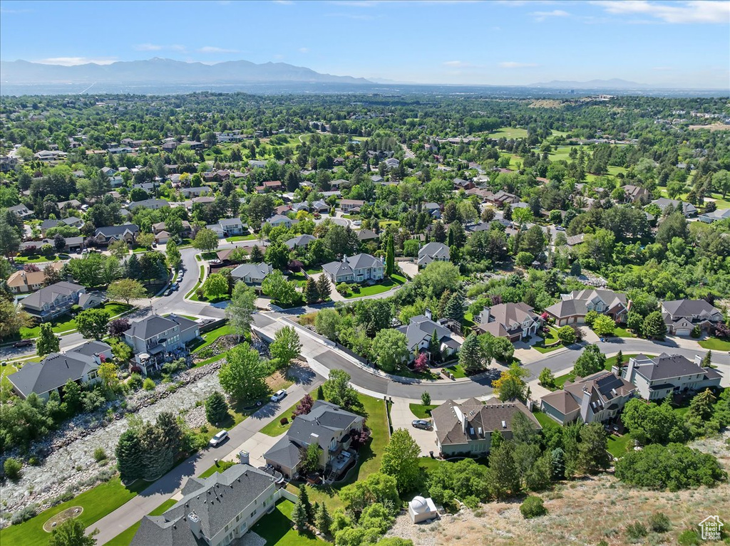 Aerial view of residential area with mountains