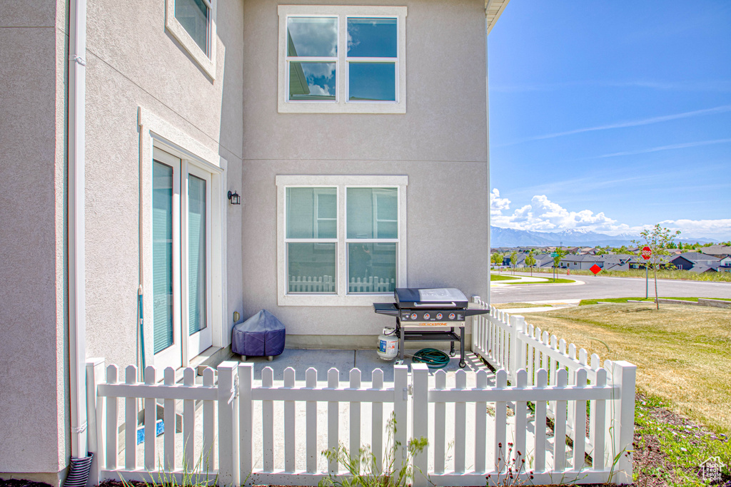 View of patio / terrace with grilling area and a mountain view