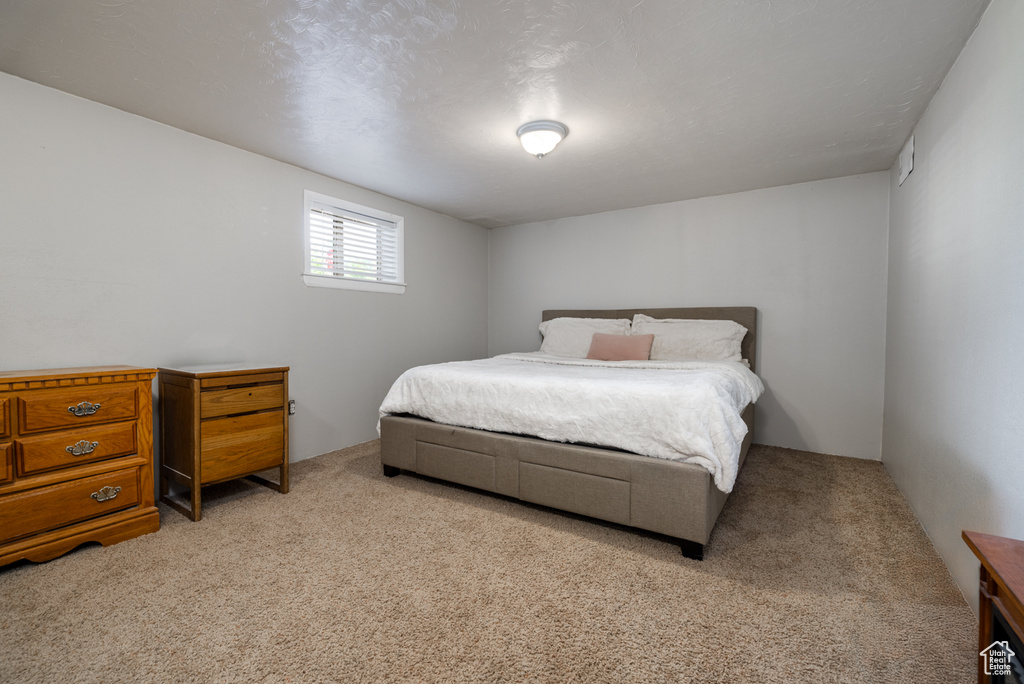 Bedroom featuring carpet