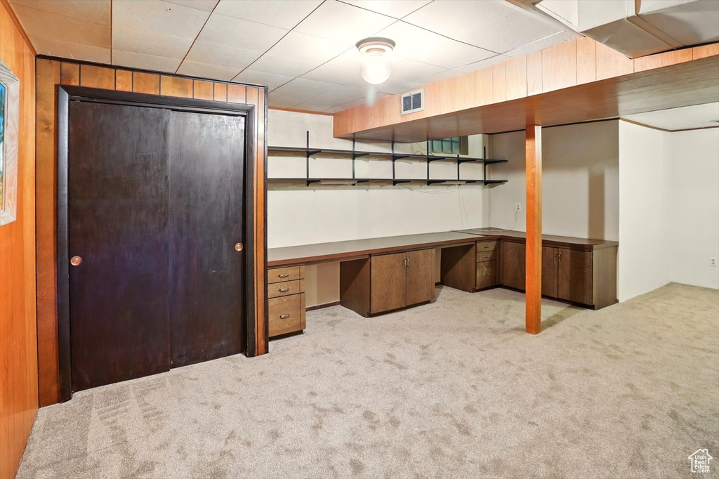 Finished basement with carpet