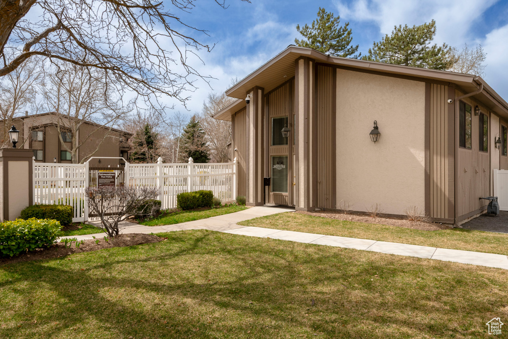 View of home's exterior featuring stucco siding