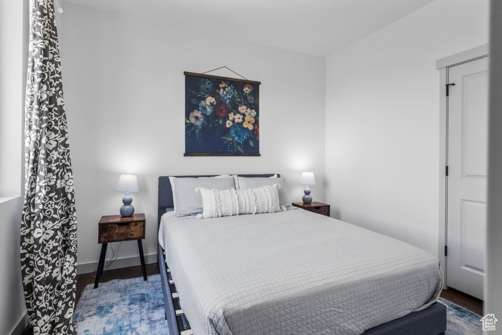 Bedroom featuring wood finished floors