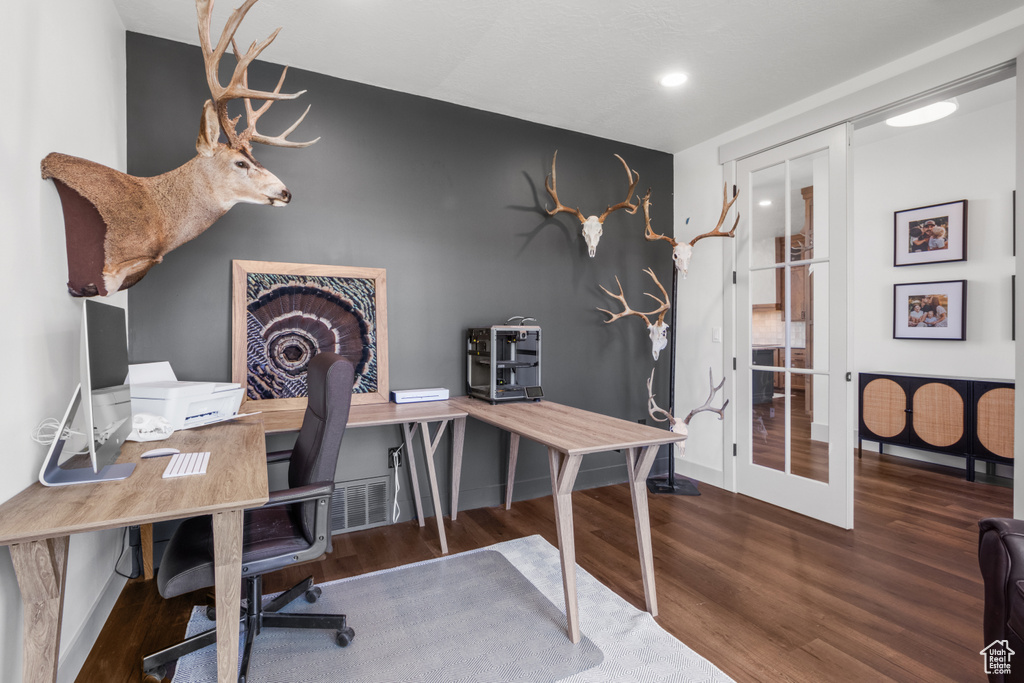 Office area featuring wood finished floors, french doors, baseboards, and recessed lighting