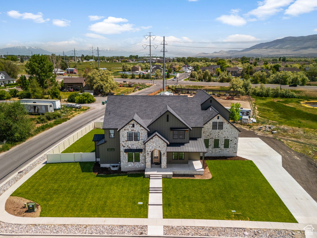 View of subject property featuring a mountain backdrop