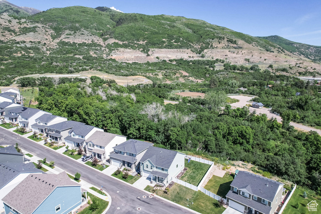 Aerial view of property\'s location with mountains and nearby suburban area
