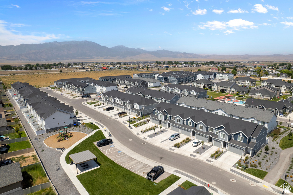 Aerial view of residential area featuring mountains