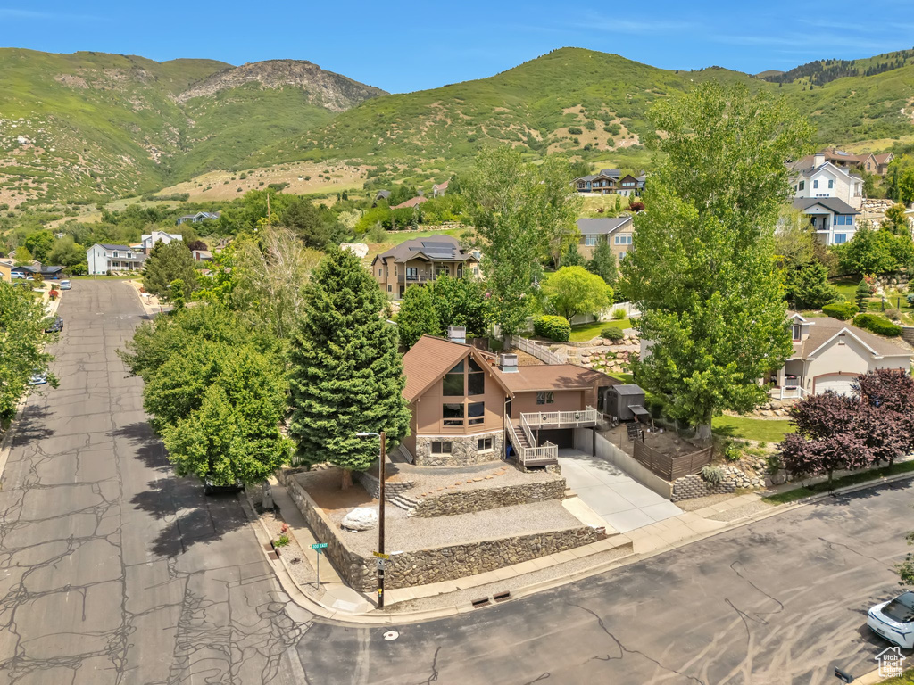 View of mountain background featuring nearby suburban area