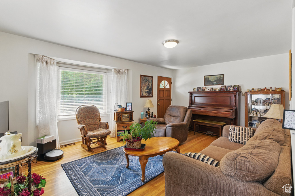 Living area featuring wood finished floors