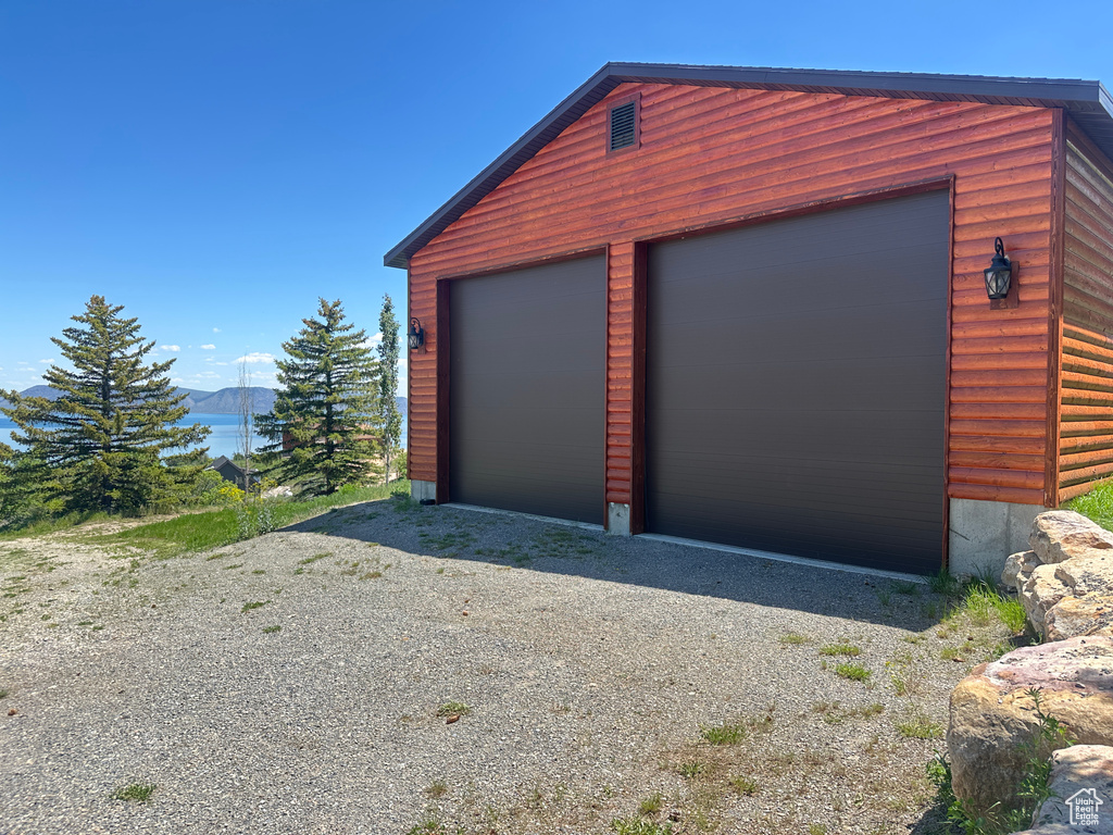 Detached garage with a mountain view