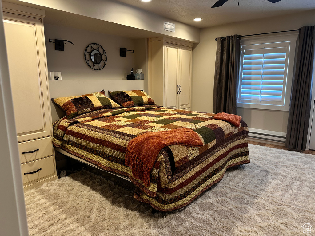 Bedroom featuring recessed lighting and a ceiling fan