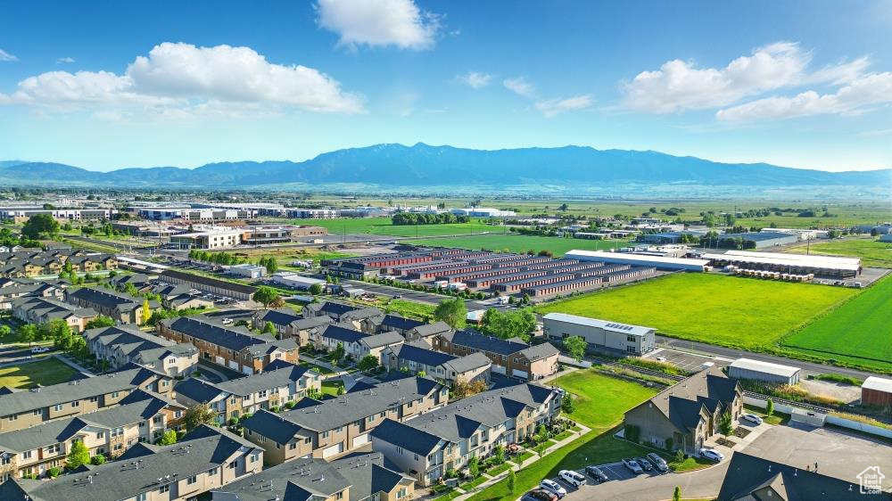 Aerial view of mountains and an industrial area