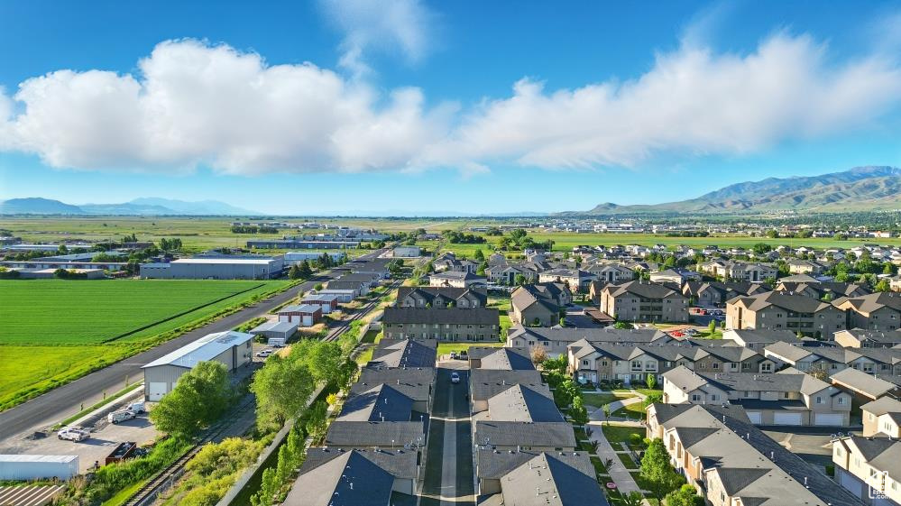 Aerial view of residential area with a mountainous background