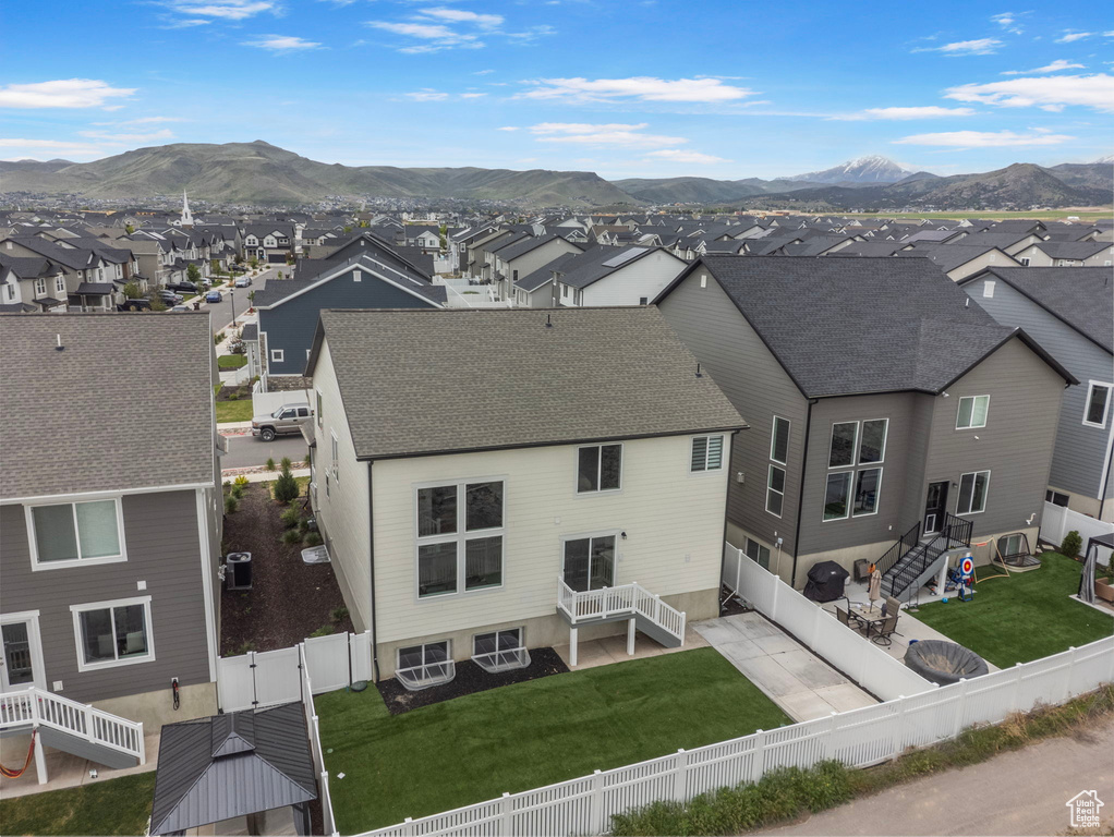Aerial perspective of suburban area with mountains