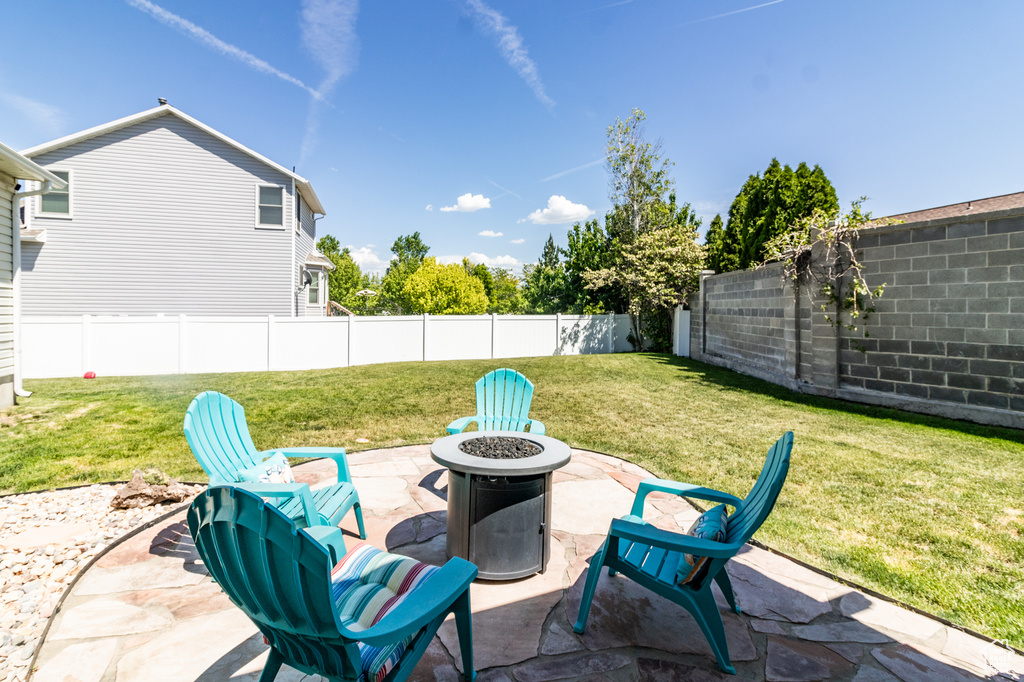 View of patio / terrace featuring a fire pit